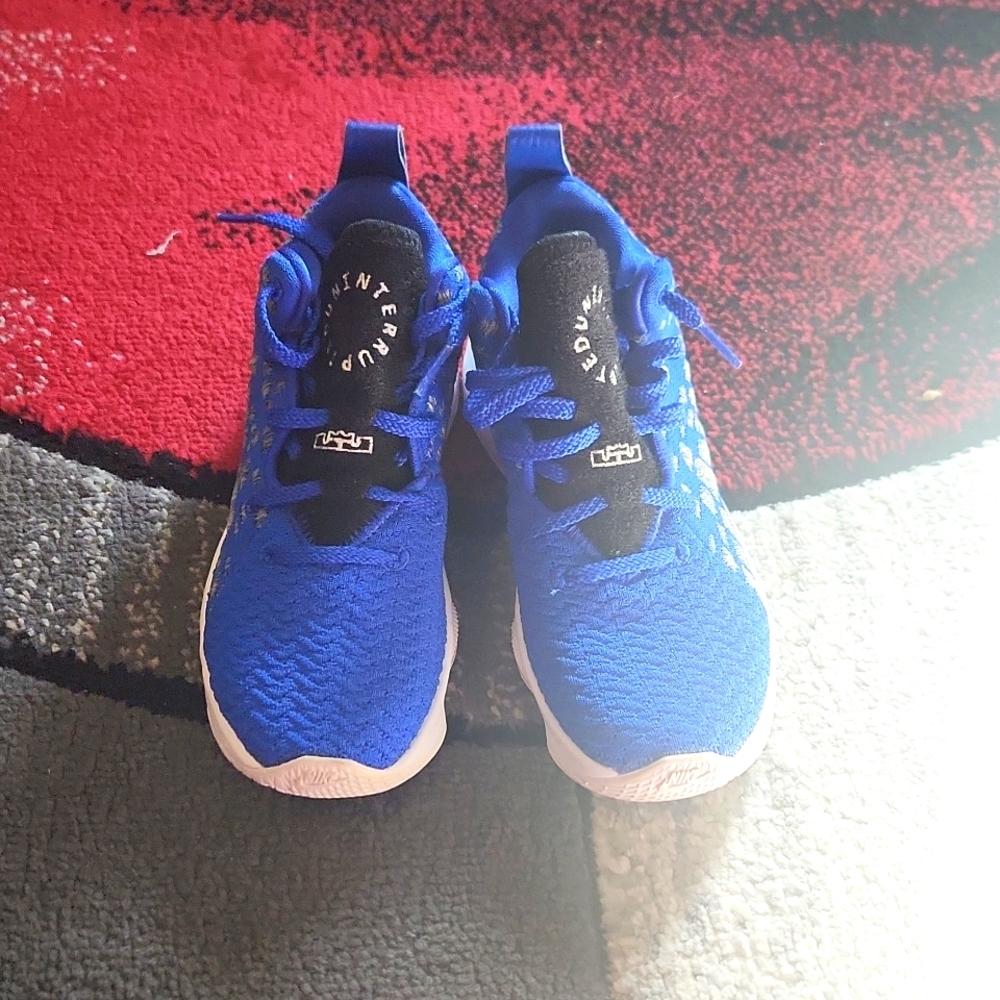 Kids Blue and white Nike sneaker